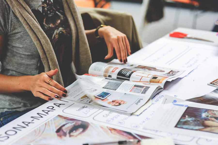Cutting pictures out of magazines